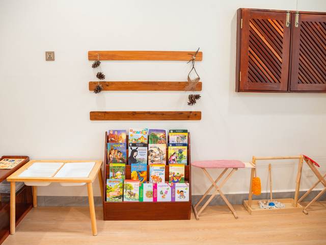 Picture books displayed face out on a low timber shelf at Orange Crest Preschool