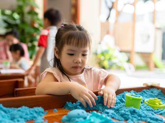 A child at work in the Panda Class at Orange Crest Preschool