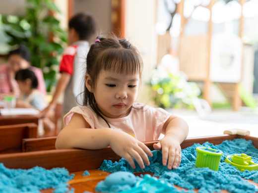 A child at work in the Panda Class at Orange Crest Preschool