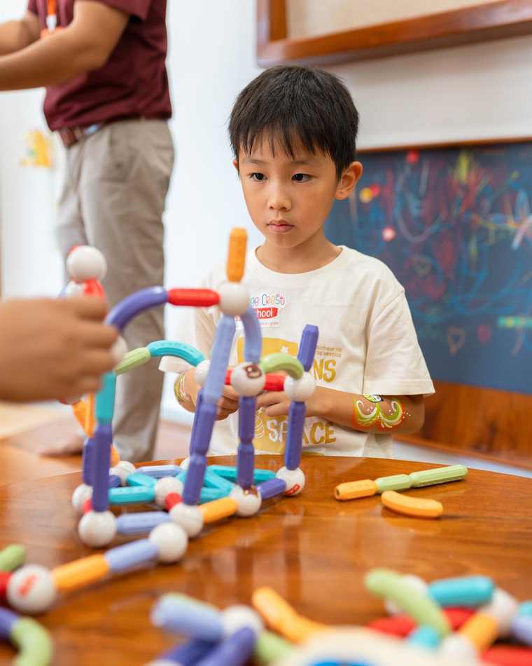 A child at work in the Giraffe Class at Orange Crest Preschool in Toul Kork