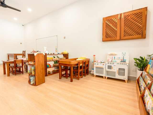 Picture books displayed face out on a low shelf at Orange Crest Preschool
