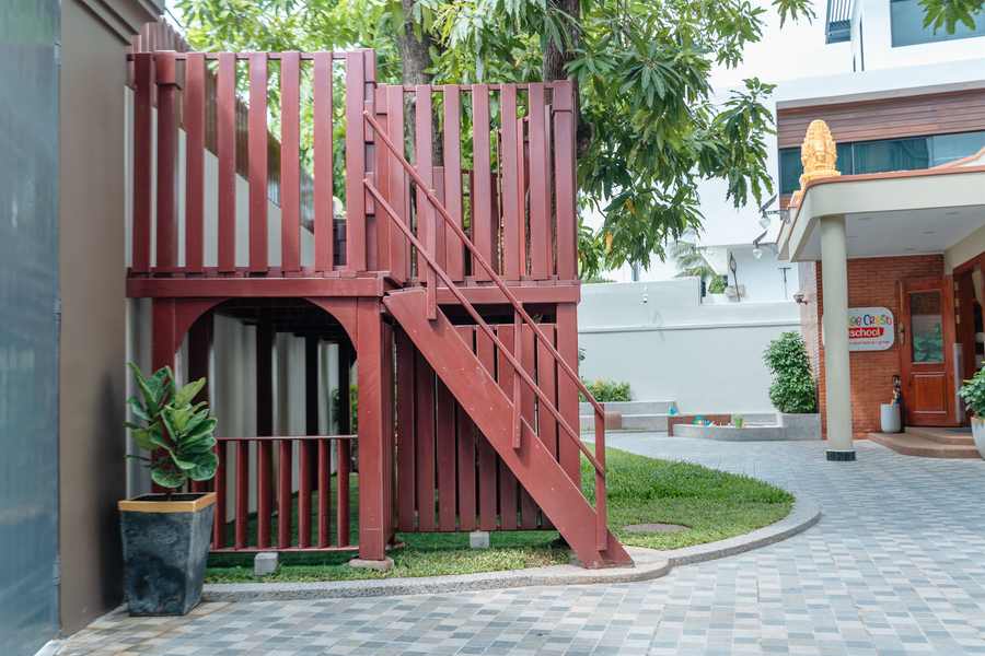An outdoor stair and play structure in the grounds of Orange Crest Preschool